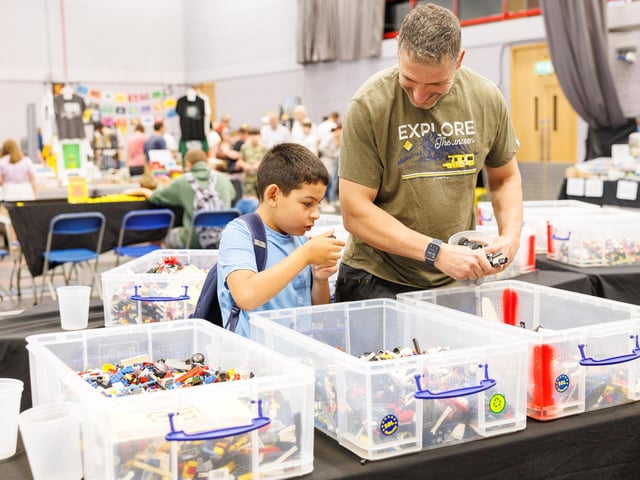 Villa with his dad Ed looking for a Lego bricks for their next build. Picture:Marcin Jedrysiak