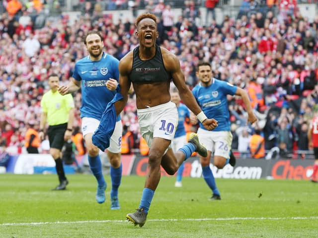 Jamal Lowe celebrates his iconic Wembley goal in Pompey's Checkatrade Trophy final win over Sunderland in March 2019. Picture: Joe Pepler