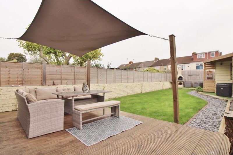 The listing says: "Accommodation on offer comprises a living room, a 20ft x 17ft fitted kitchen/dining room complete with granite worktops and integral appliances, a downstairs W.C and a utility room."