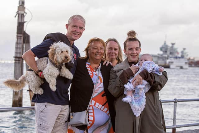 Steve and Sue Johnstone with Christine Ward, Ellie Wright and Poppy Johnstone, 11 weeks, waiting for Glen Johnstone on HMS Queen Elizabeth to pass The Point, Old Portsmouth
Picture: Habibur Rahman