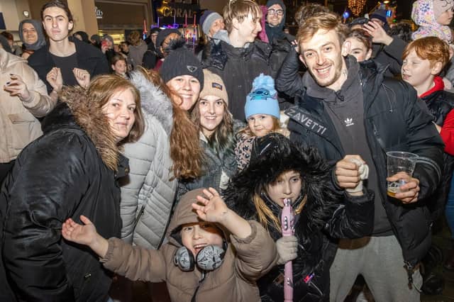 The crowds braved the wind and rain to watch the Christmas lights being switched on in Fareham highstreet on Saturday evening, while some of the entertainment was moved into the shopping centre.
Pictured - Crowds enjoyed the free entertainment on the Highstreet and in the shopping centre
Photos by Alex Shute