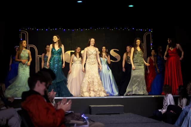 Group shot featuring Mousetrap Dress Boutique dresses.