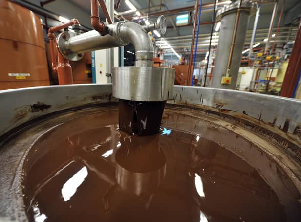 A picture shows hot chocolate before being moulded at the Barry Callebaut chocolate factory in Wieze, Belgium. Picture: GEORGES GOBET/AFP via Getty Images.