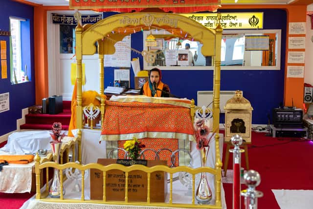 Kamaljit Kaur (28) chanting the Guru Granth Sahib Sukhmani Sahibji. Picture: Mike Cooter (010522)