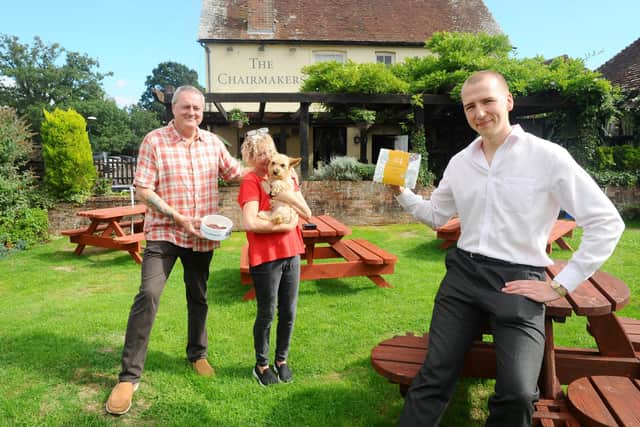 Landlords of The Chairmakers Angus and Sherry Reid with their dog Toffee and managing director Tyler Daly from Paleo Ridge. Picture: Sarah Standing (080920-3642)