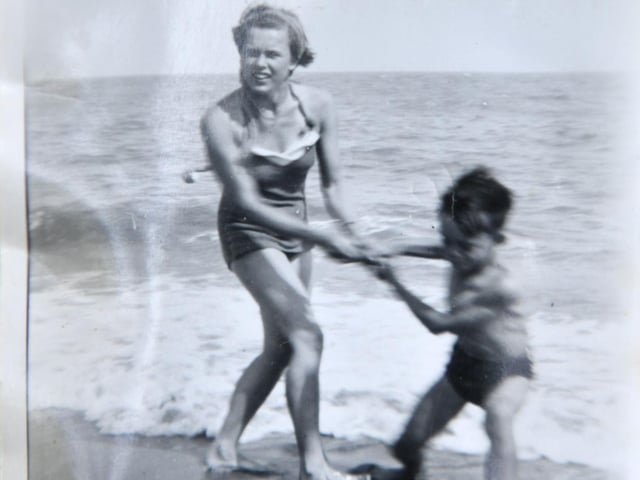 Janette enjoying the beach when she was younger