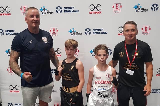 Team Wiseman head coach Daron Wiseman, left, national schoolboy championship duo Bradley Jordan, second left, and Morgan Skyrme with Team Wiseman coach and Bradley's dad, Michael, right