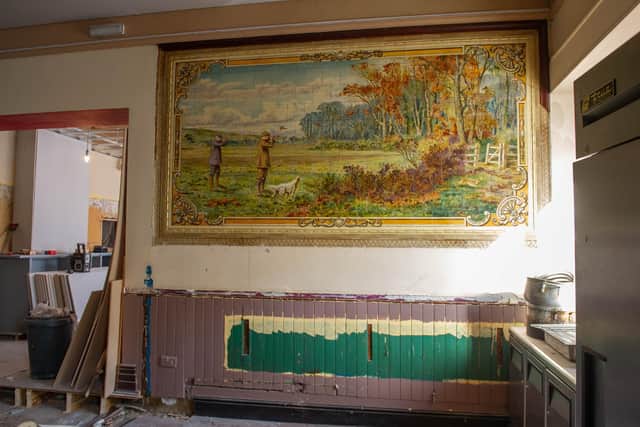 One of the tile displays in the pub, believed to date back to 1902.  Picture: Habibur Rahman