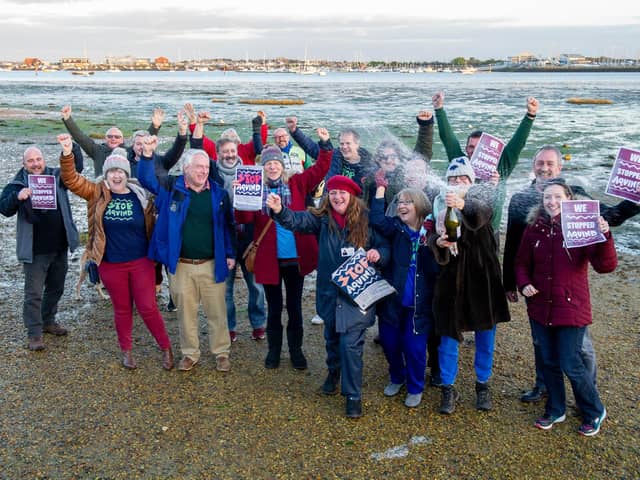 Stop Aquind protestors with council leader Gerald Vernon-Jackson and Cllr Lee Hunt to celebrate near Lock Lake, Portsmouth

Picture: Habibur Rahman