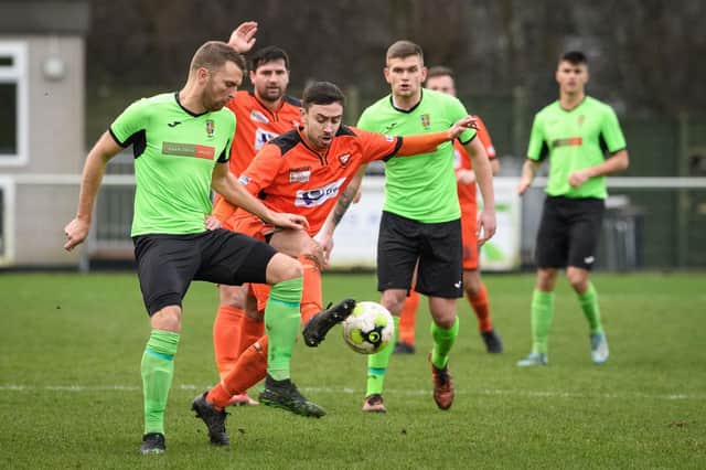 Alex Baldacchino (orange kit) is back in the AFC Portchester reckoning for this weekend's home game with rock bottom Amesbury. Picture: Keith Woodland.
