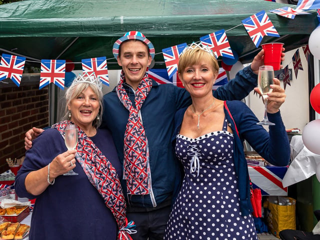 Residents at the Duncan Road jubilee street party. Pictured: Teri Kirk (56), Sean Lynch (28) and Kathleen Rutter (57). Picture: Mike Cooter (050622)