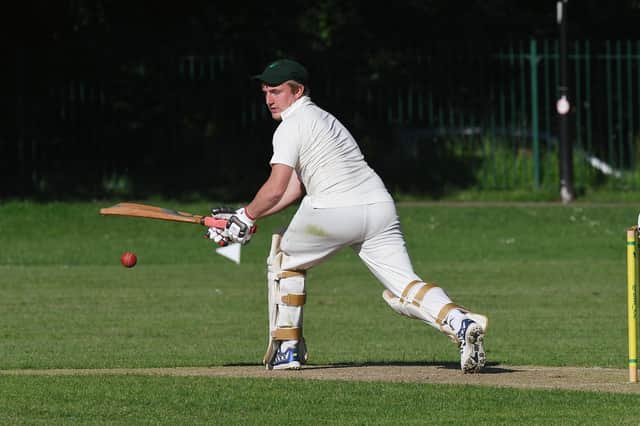 Harry Robbins impressed with bat and ball as Portchester defeated Wickham. Picture: Neil Marshall