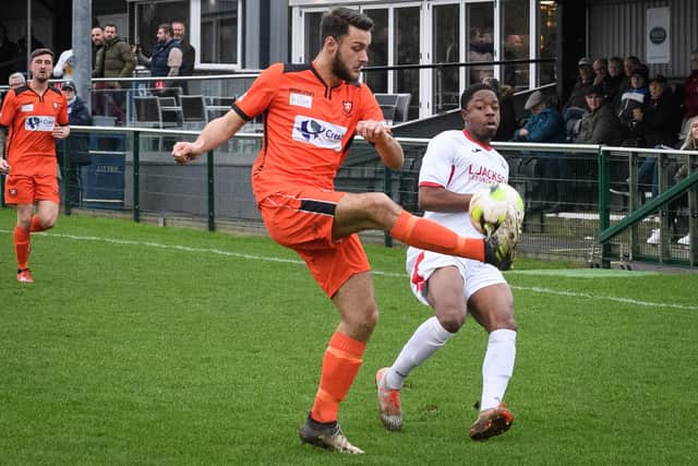 New US Portsmouth defender Jack Barker, left, in action for AFC Portchester in 2019/20. Picture: Keith Woodland