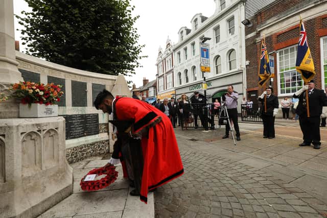 Mayor of Havant, Cllr Prad Bains, lays a wreath at the VJ Day commemoration at St Faith's Church, Havant
Picture: Chris Moorhouse    (150820-03)