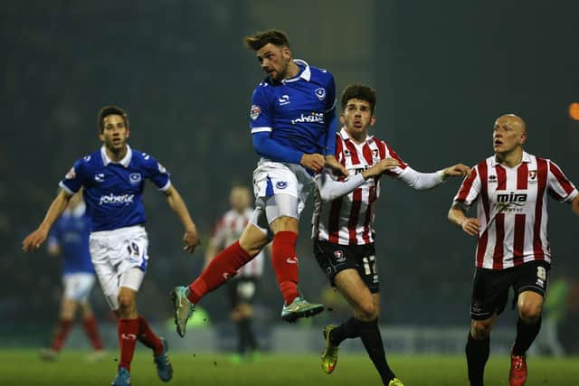 Danny East, seen here winning a header against Cheltenham, made 23 appearances for Pompey. Picture: Joe Pepler