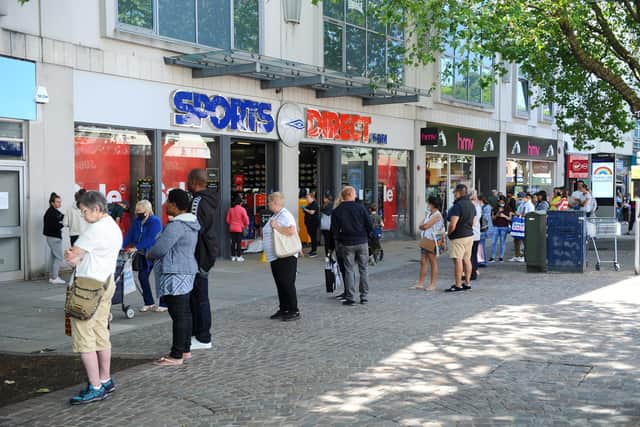 Pictured: Queuing for Sports Direct in Commercial Road, Portsmouth when shops reopened on June 15.
Picture: Sarah Standing (150620-9963)
