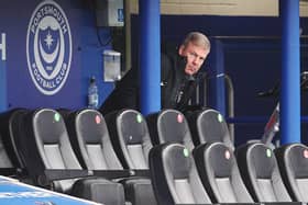 Manager Kenny Jackett watched the game from behind the dugouts at Fratton Park.