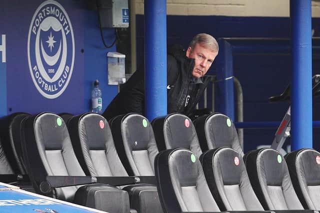 Manager Kenny Jackett watched the game from behind the dugouts at Fratton Park.