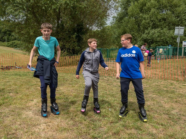 Testing out the Kangaroo Jump Boots at the Party in the Warren. Picture: Mike Cooter (080723)