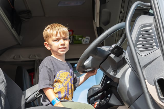 The local community were invited to explore the Portsmouth International Port on Saturday.

Pictured - Youngster Arthur Lock, 3 enjoying one of the trucks on display

Photos by Alex Shute