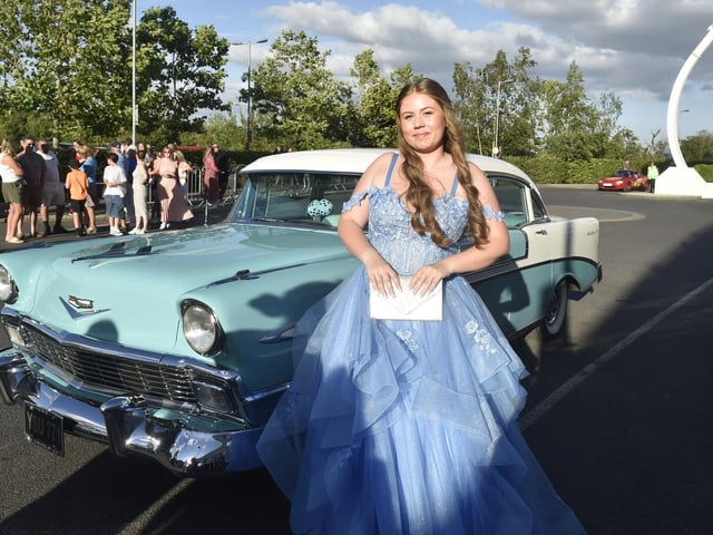A pupil from Purbrook Park School arrives in a classic car to their school prom at the Utilita Bowl.Picture: Sarah Standing (270624-5802)