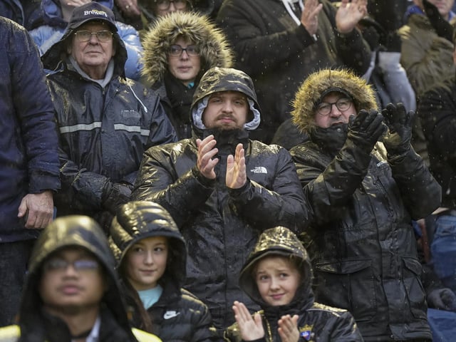 Pompey fans back at Fratton ParPompey fans braved terrible weather conditions on New Year's Day to cheer the Blues to victory against Swansea.