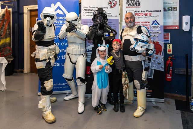 Ace Kellett, five, and Tommy Kellett, seven, with stormtroopers in the Star Wars Experience