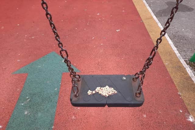 Baked beans had been left smeared on play equipment in a children's park, sparking confusion online. Photo: Facebook
