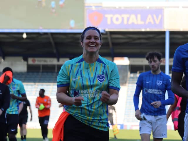 Staff team player Jo Fairwood celebrating after the win at Fratton Park.