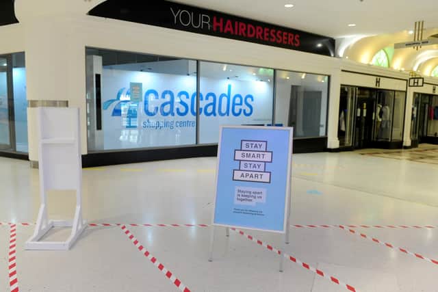 The Cascades Shopping Centre has installed a vending machine that sells singular face masks.
Picture: Sarah Standing (150620-9836)