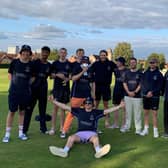 Champions - Hambledon celebrate with the Southern Premier League Division 3 silverware.