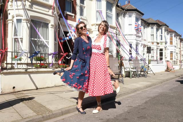 Residents in Herbert Road, Southsea, celebrated The Queen's Platinum Jubilee with a street party on Thursday, June 2, 2022. Pictured is: (l-r) Ana Chapero-Hall (26) with her mum Montse Chapero (56). Picture: Sarah Standing (020622-8755).
