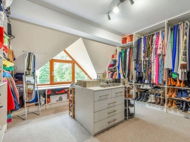The listing says that this house 'offers deceptively spacious accommodation comprising of five bedrooms, three with en-suite shower rooms, family bathroom, four reception rooms and a feature fitted kitchen/breakfast room.'