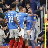 Pompey celebrate Ryan Tunnicliffe's third-minute winner. Picture: Jason Brown