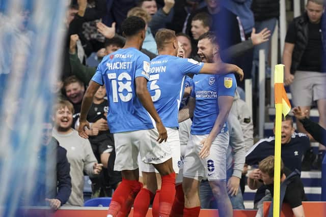 Pompey celebrate Ryan Tunnicliffe's third-minute winner. Picture: Jason Brown