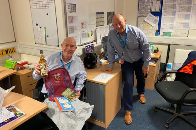 Steve Jones (left) with his retirement gifts from colleagues in the facilities management team at Queen Alexandra Hospital in Cosham. Picture: Steve Jones