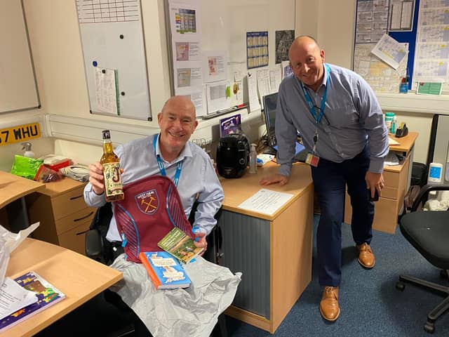 Steve Jones (left) with his retirement gifts from colleagues in the facilities management team at Queen Alexandra Hospital in Cosham. Picture: Steve Jones