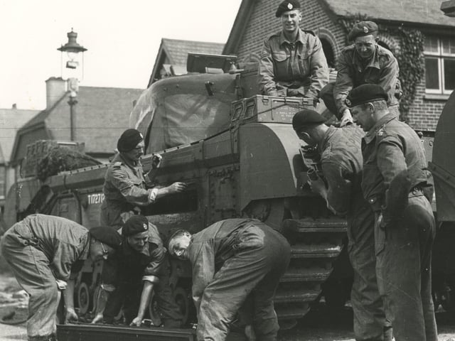 Churchill  tank crews prepare to embark(c) The News, War Series 2873
