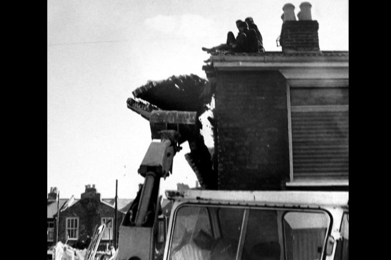 Precarious demonstration in Somerstown 1978. In May 1978 Portsmouth Council arranged for demolition of houses in Cumberland Road.  Picture: Roy West, The News archive.