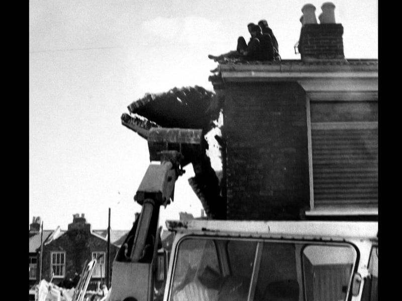 Precarious demonstration in Somerstown 1978. In May 1978 Portsmouth Council arranged for demolition of houses in Cumberland Road. Picture: Roy West, The News archive.