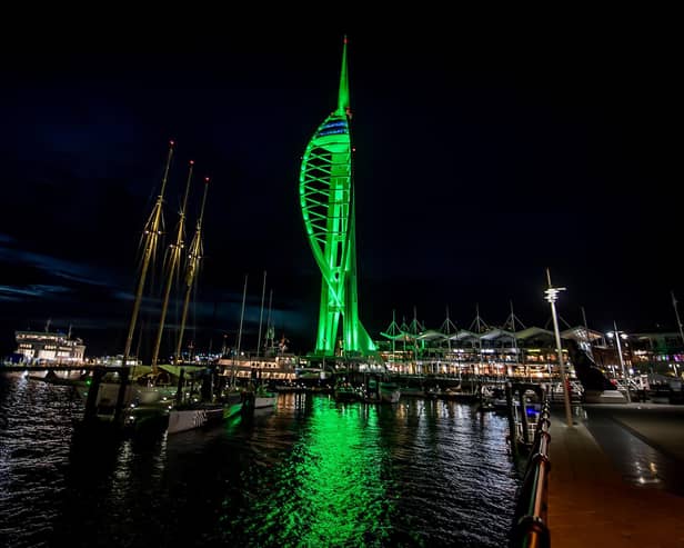 The Spinnaker Tower turns green. Picture by Dave Vokes.