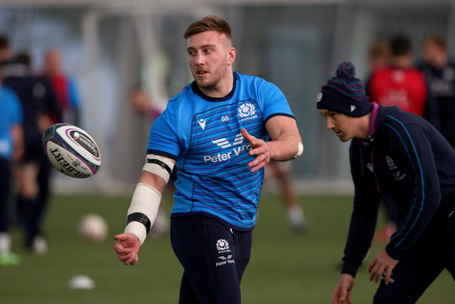 Glasgow back-rower holds off the challenge of in-form Edinburgh No 8 Magnus Bradbury, who is on the bench.