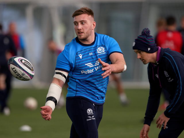 Glasgow back-rower holds off the challenge of in-form Edinburgh No 8 Magnus Bradbury, who is on the bench.
