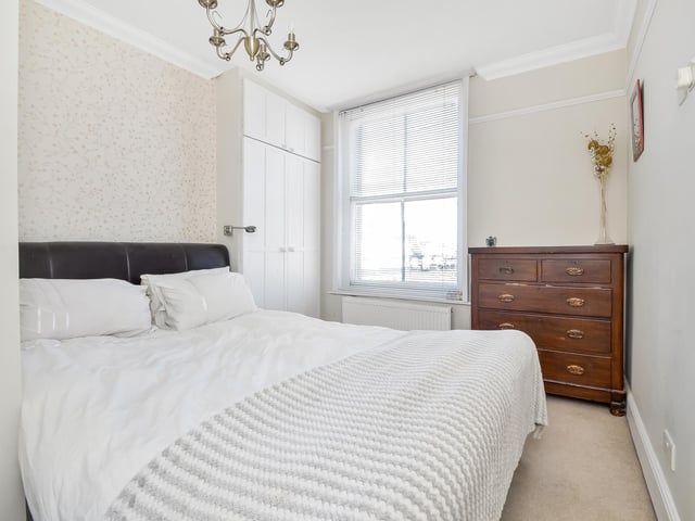 An en-suite bedroom is located on the first floor, with two more, both en suite, on the second floor.
