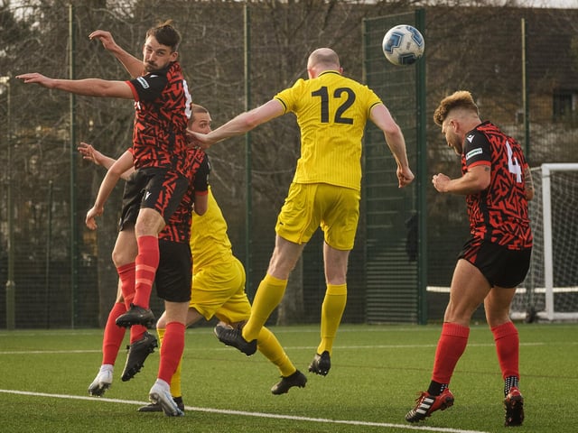 Action from Harvest's 4-1 win at home to Locks Heath (red and black kit) in the Hampshire Premier League. Picture: Keith Woodland (180321-900)