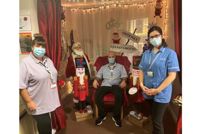 Caption: Staff at the Shearwater care home in Southsea are looking forward to working on Christmas Day. Pictured: L-R is Sabrina Jackson, activities co-ordinator,Thom Harris, senior carer and Katarina Labikova, assistant unit manager. Picture: Shearwater care home