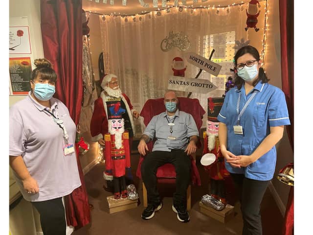 Caption: Staff at the Shearwater care home in Southsea are looking forward to working on Christmas Day. Pictured: L-R is Sabrina Jackson, activities co-ordinator,Thom Harris, senior carer and Katarina Labikova, assistant unit manager. Picture: Shearwater care home