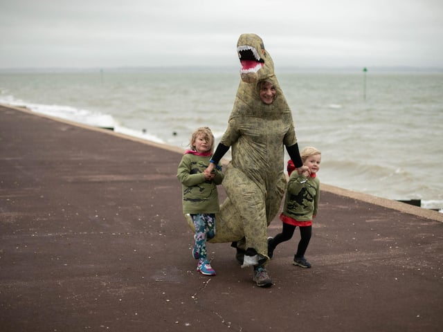 Supporters turned out for the final mile despite wet and windy weather.