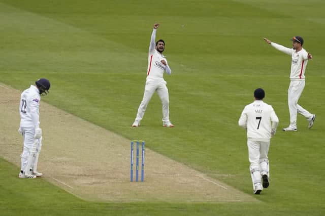 Lancashire's Hasan Ali celebrates after taking the wicket of Hampshire's Ian Holland. Picture: Andrew Matthews/PA Wire.