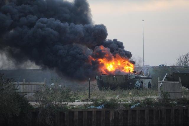 A military vehicle on fire at the Pounds yard in Portsmouth. 26th November 2011